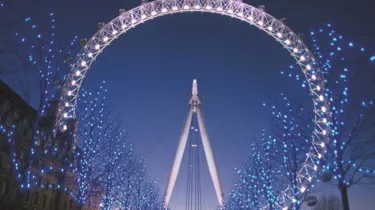 London Eye at night lit up white
