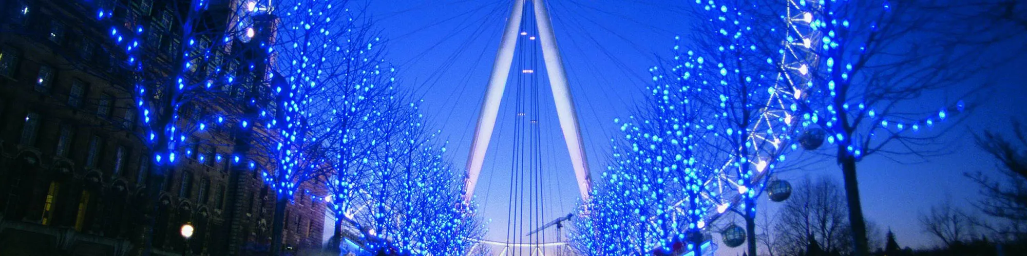 London Eye lit up blue christmas scene