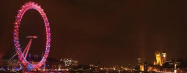 London Eye In Pink And Red Lights