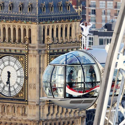 Mo Farah standing on London Eye pod