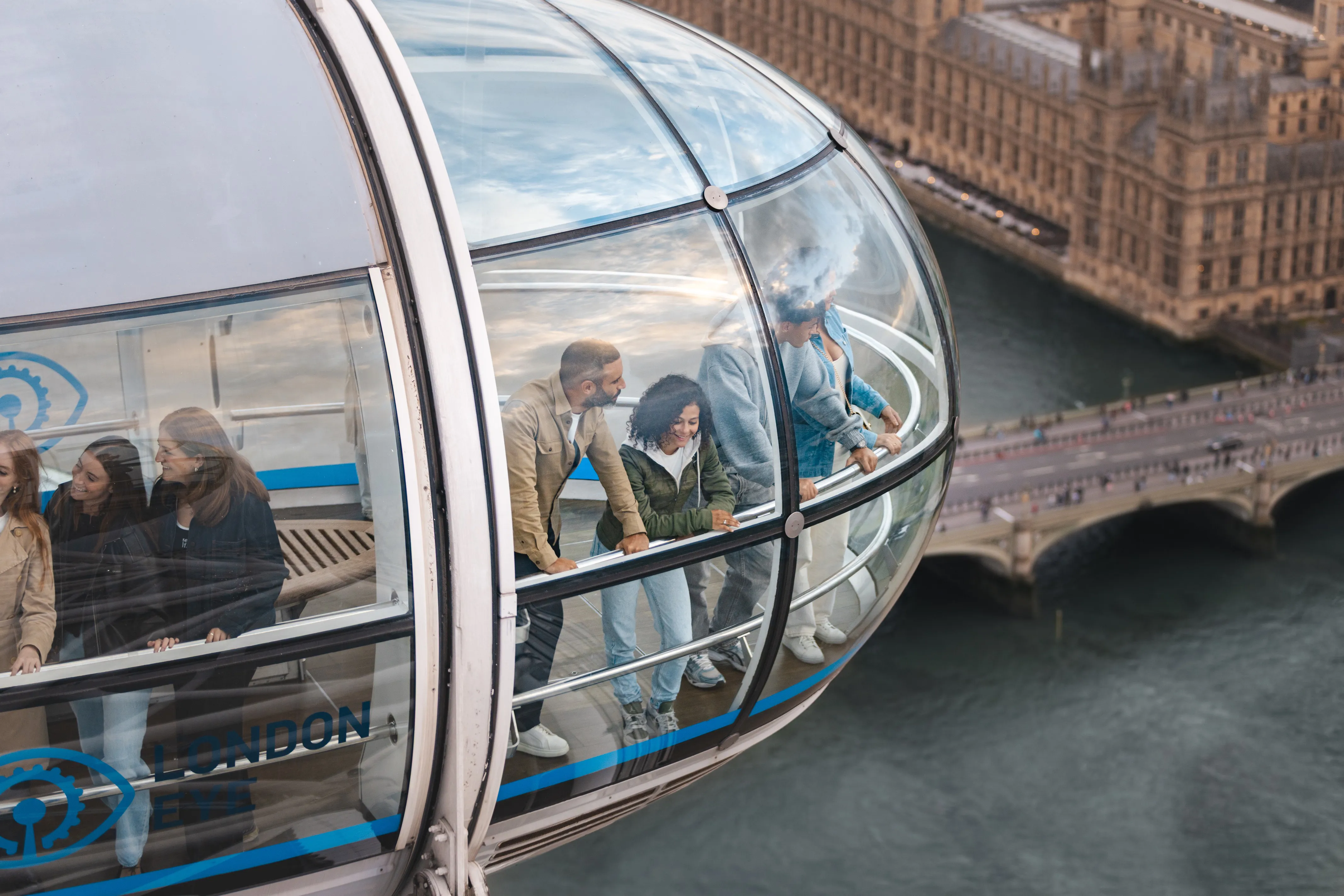 picture of london eye pod with people inside 