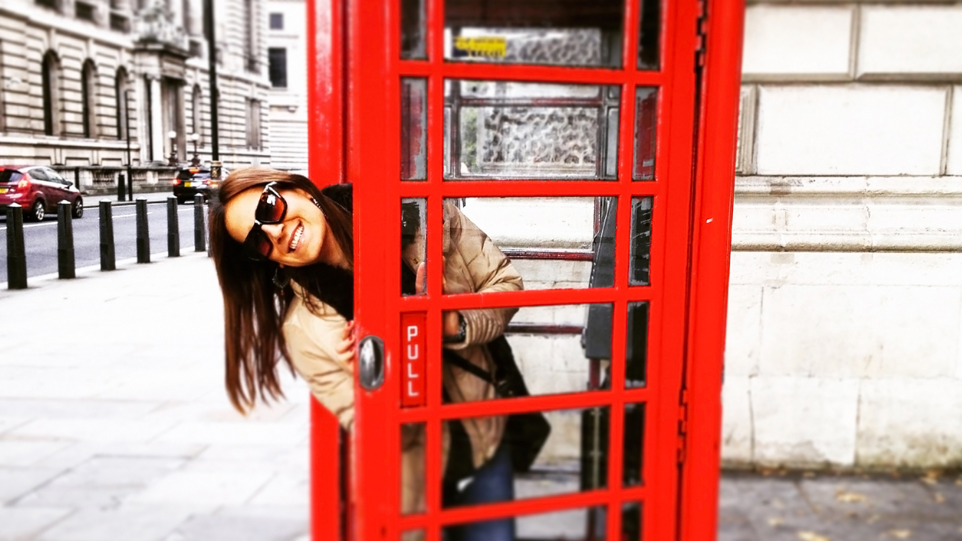 Lady in a London phone booth