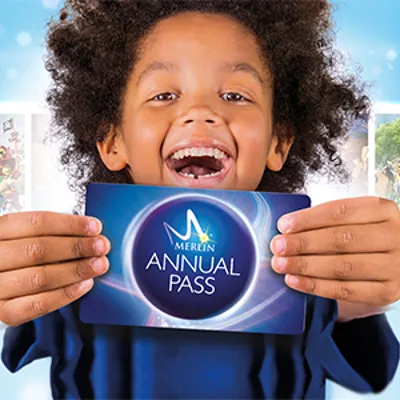Boy holding MAP pass