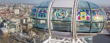 London Eye with 15th birthday stickers on pod