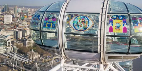 London Eye with 15th birthday stickers on pod