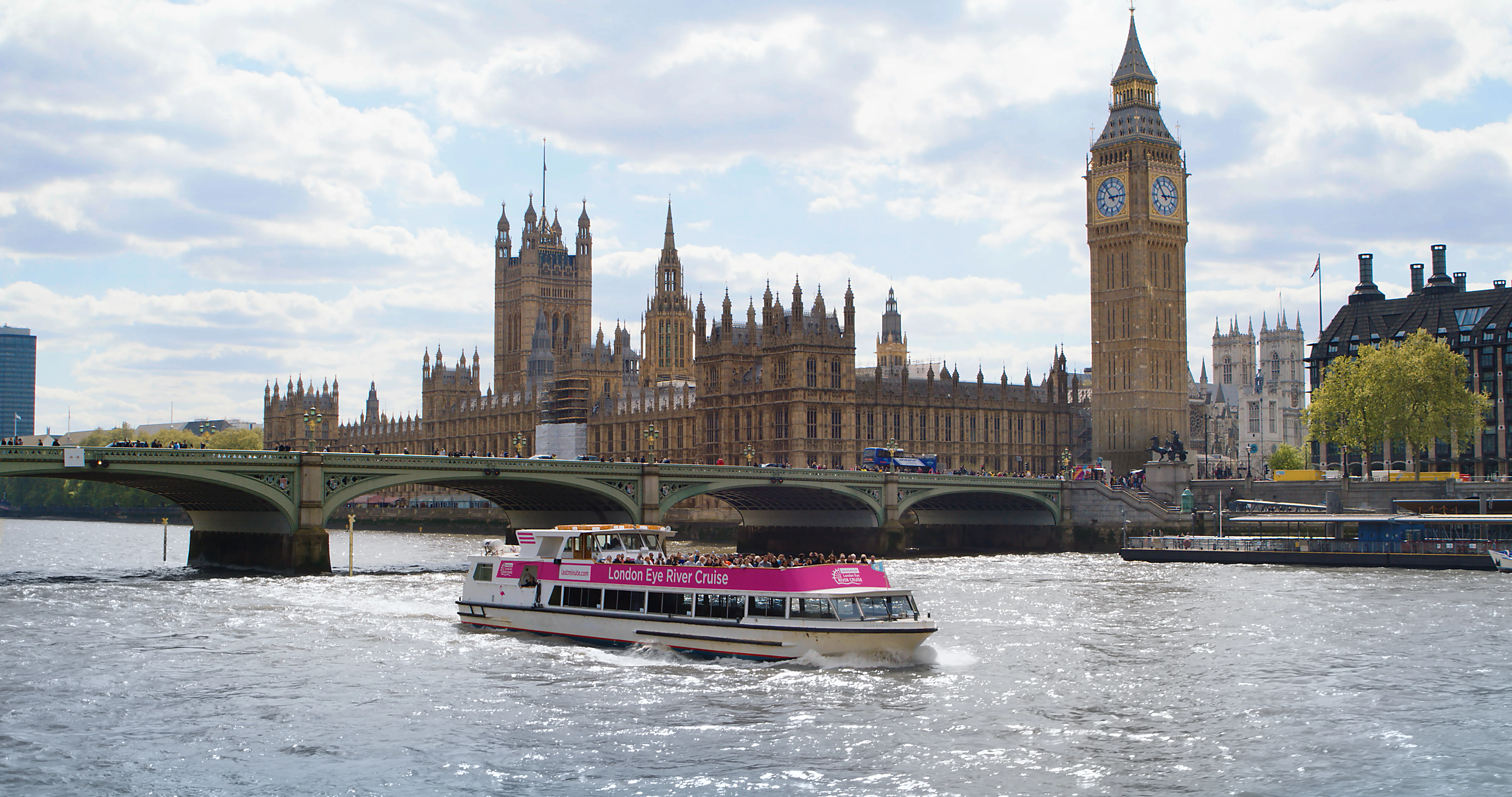 London Eye River Cruise sailing on the River Thames in front of Big Ben