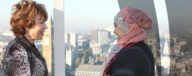 Two women on London Eye celebrating International Day Of the Girl