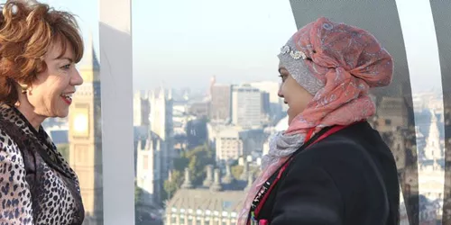 Two women on London Eye celebrating International Day Of the Girl
