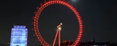 London Eye lit up red at night