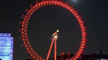 London Eye lit up red at night